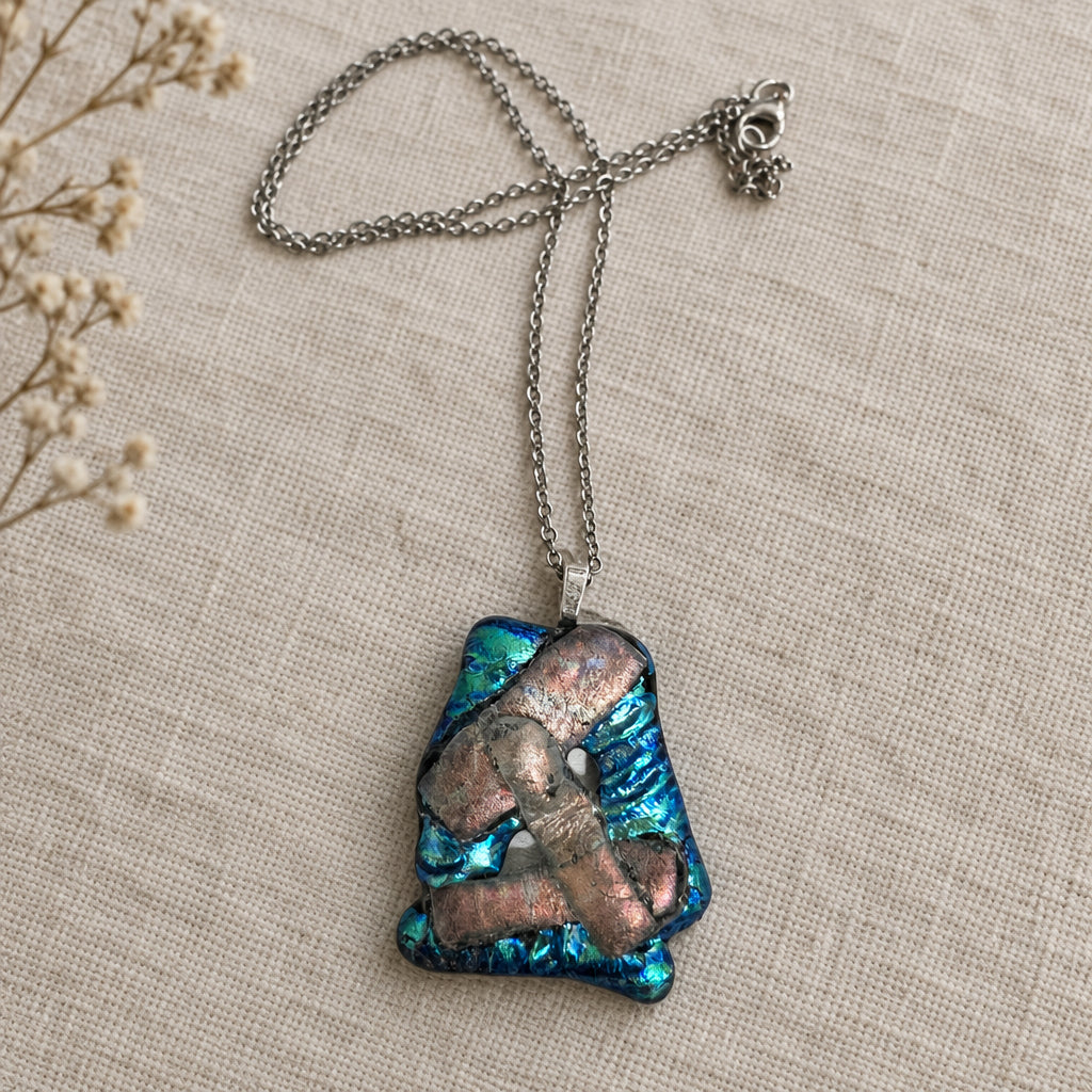 Alternate view of turquoise and pink layered glass pendant on a silver-tone chain