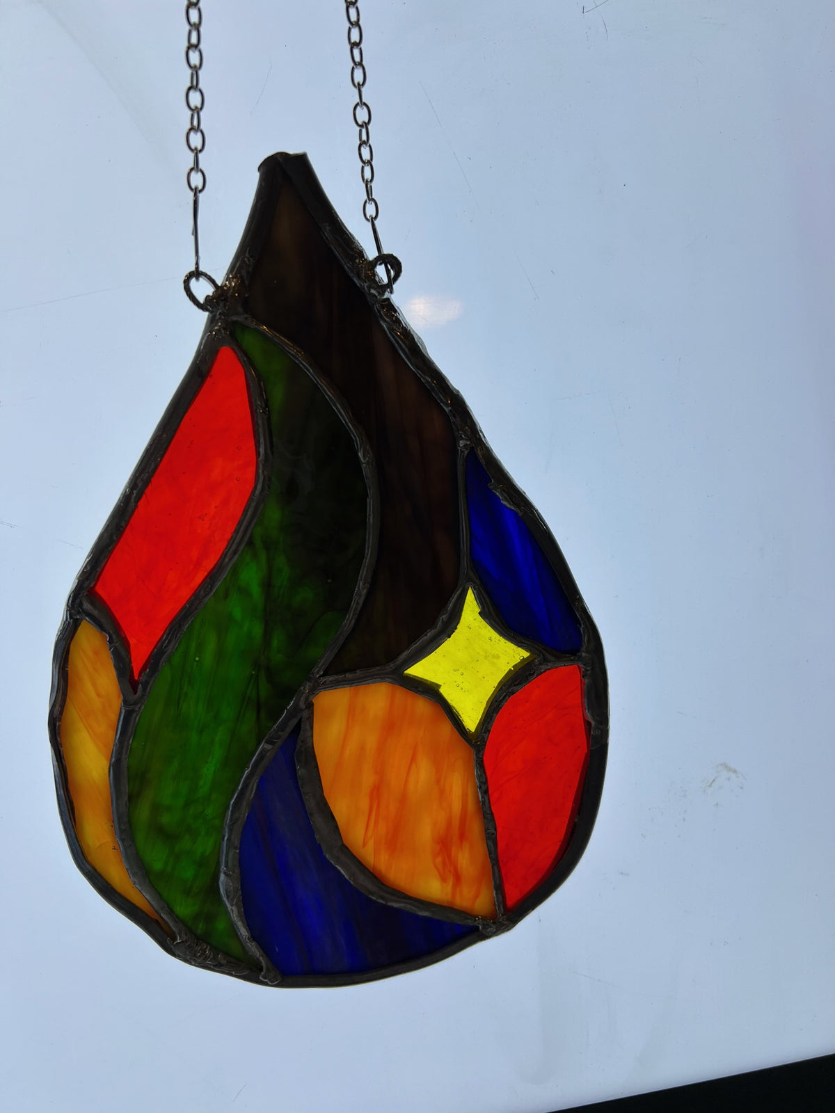 Abstract teardrop stained glass suncatcher